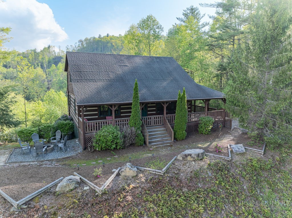 197 Woodby Ridge Road Vilas, NC 28692 - Photo 1 of 45 front view of a house with a yard