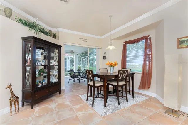 a bedroom with furniture and a chandelier