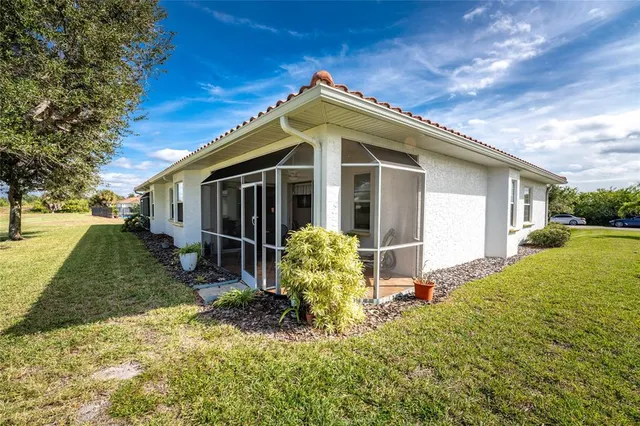 a view of a lake with a big yard