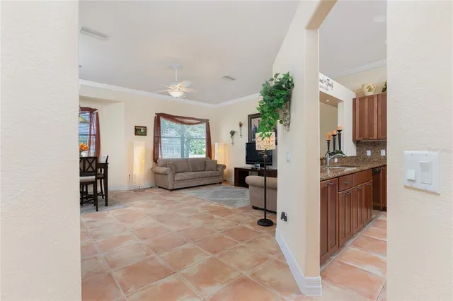 a kitchen with stainless steel appliances granite countertop a refrigerator oven a sink and dishwasher