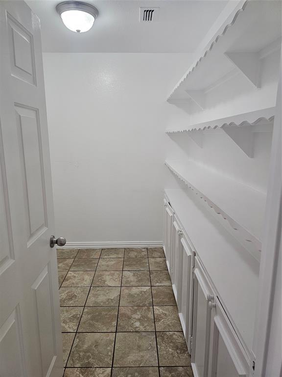 3009 Meadow Bluff Drive Wylie, TX 75098 - Photo 15 of 24 a view of an empty walk in closet