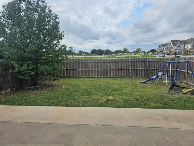 a view of a garden with a slide