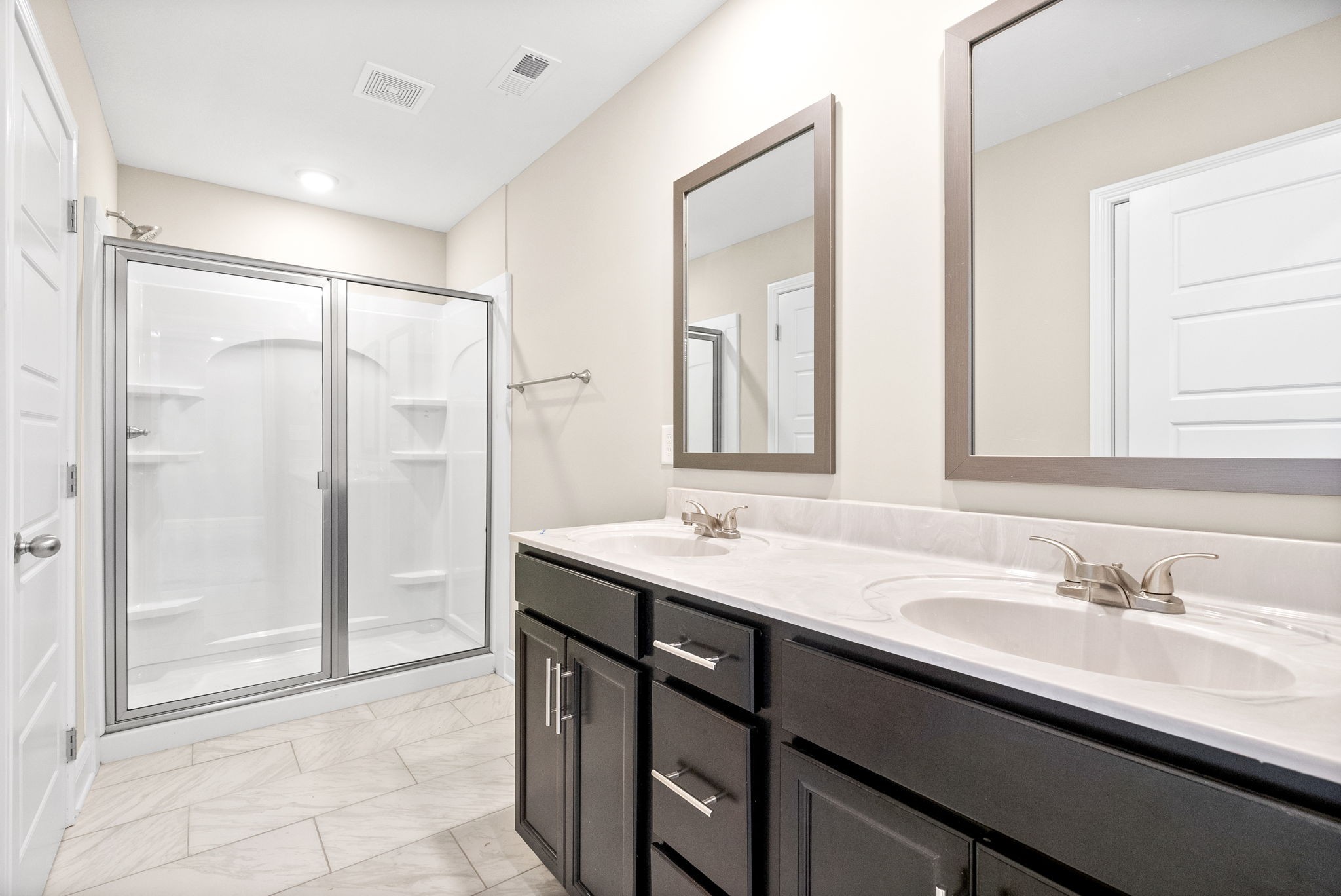 1237 Cardinal Crk Drive Clarksville, TN 37040 - Photo 14 of 26 a bathroom with a sink double vanity and a mirror