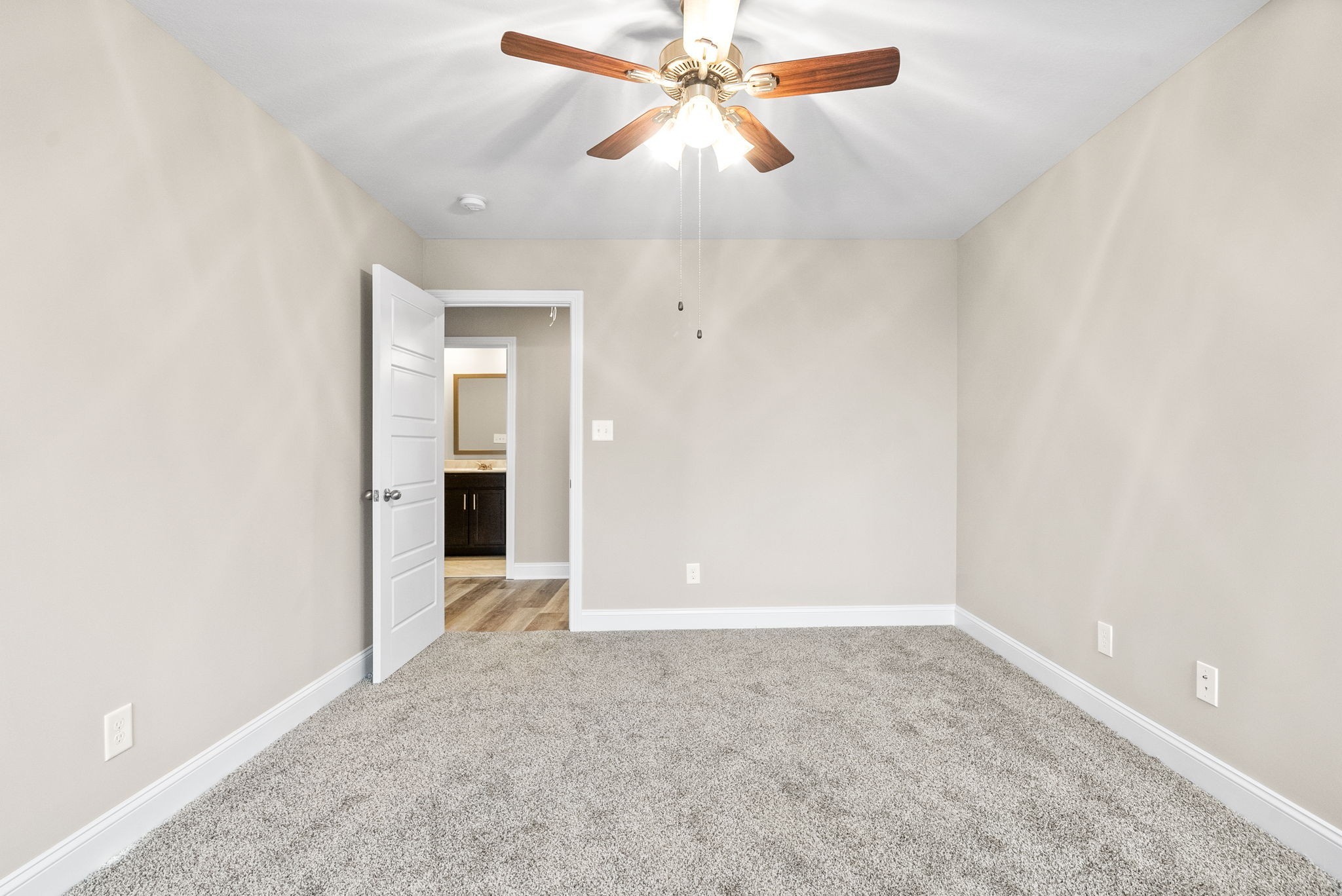1237 Cardinal Crk Drive Clarksville, TN 37040 - Photo 16 of 26 an empty room with closet and a chandelier fan