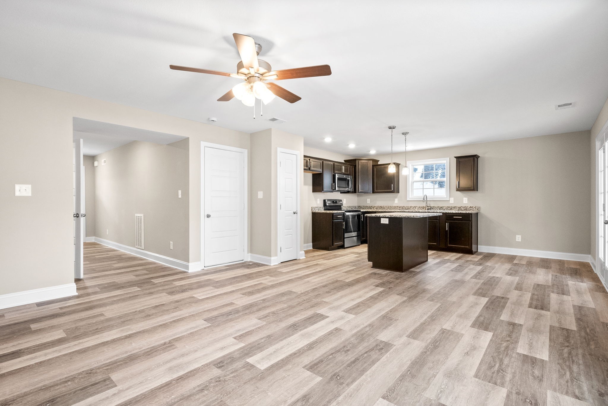1237 Cardinal Crk Drive Clarksville, TN 37040 - Photo 6 of 26 a view of kitchen with granite countertop cabinets and refrigerator