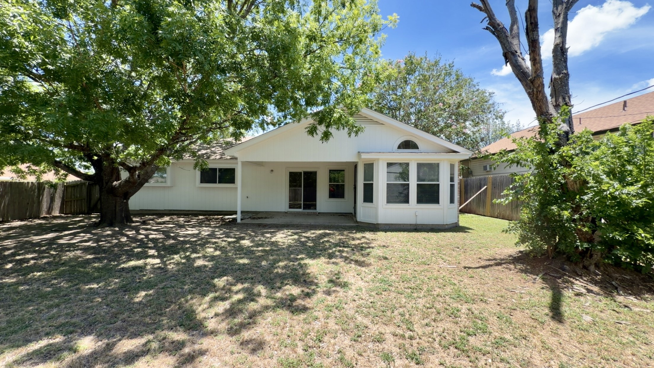 505 Robertstown Road Copperas Cove, TX 76522 - Photo 5 of 24 A picturesque view from the back yard with a sprawling oak tree and nice sized covered patio
