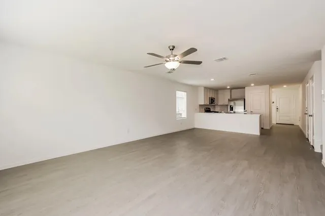 a view of a kitchen with a sink