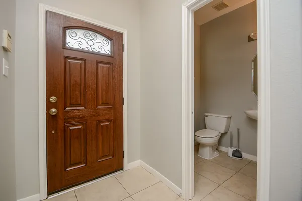a view of a bathroom with a toilet and a sink