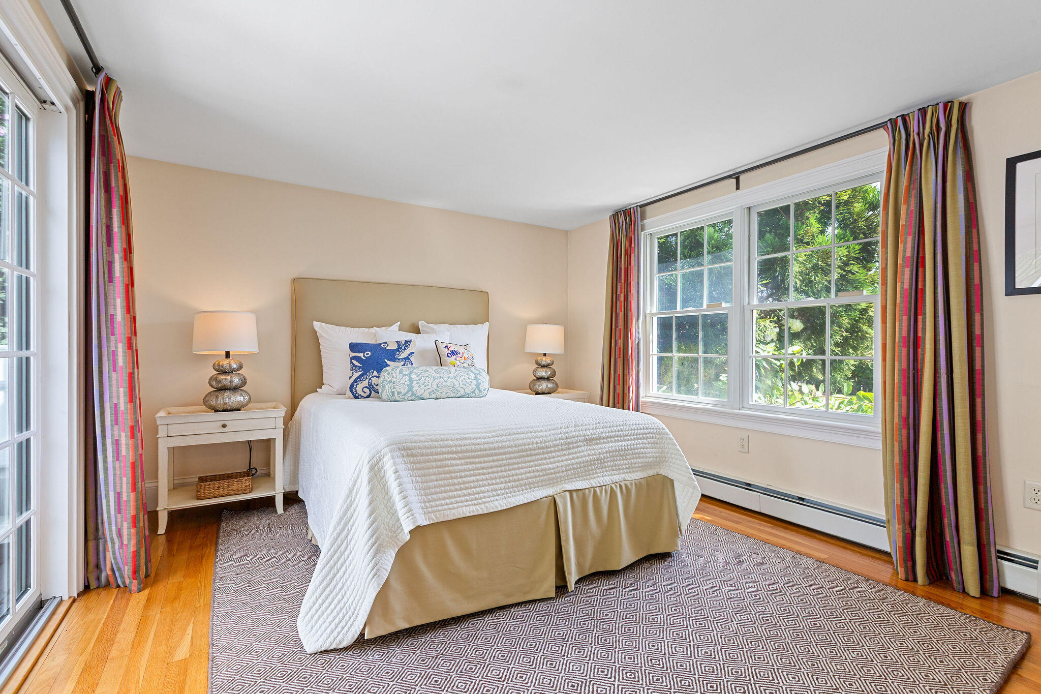 36 Cedar Land Road Orleans, MA 02653 - Photo 75 of 100 a spacious bedroom with a bed and a window