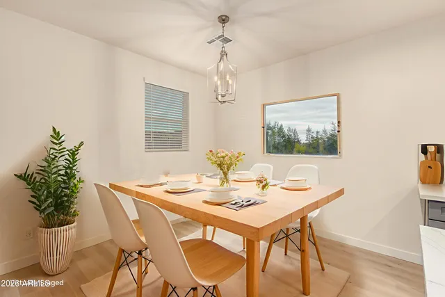 a large kitchen with kitchen island a sink and a stove