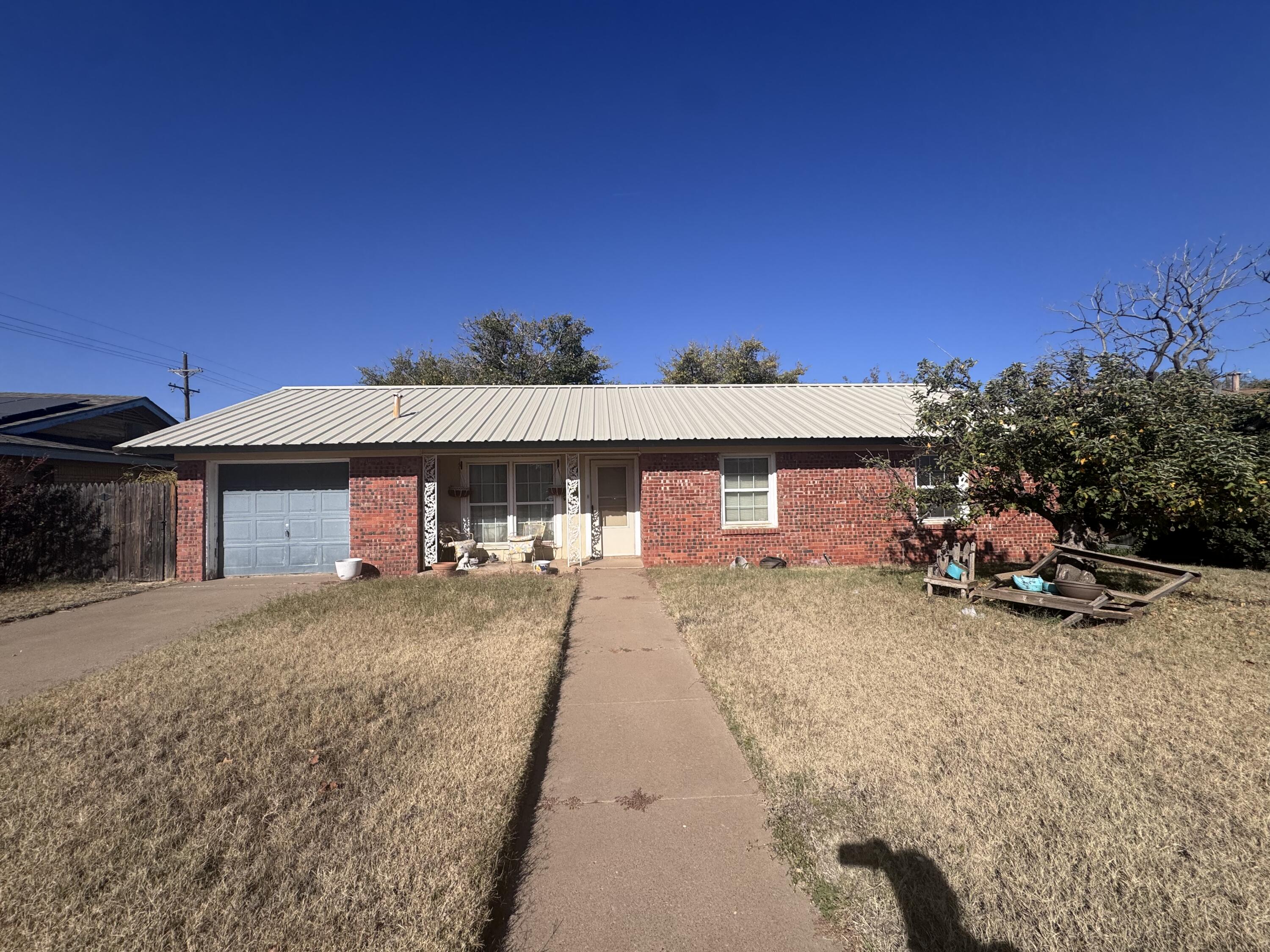 a view of a house with a patio