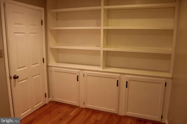 a utility room with closet dryer and washer