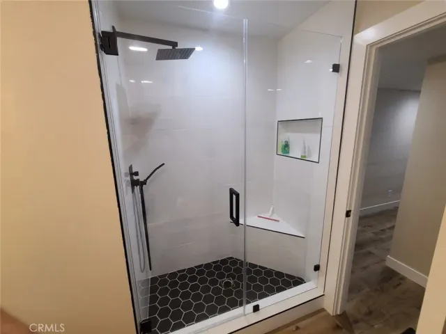 a room with mirror and window