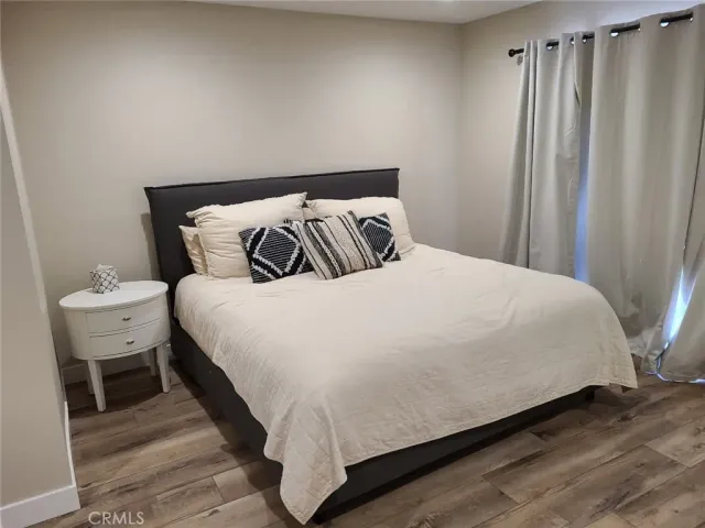 a kitchen with a sink and refrigerator
