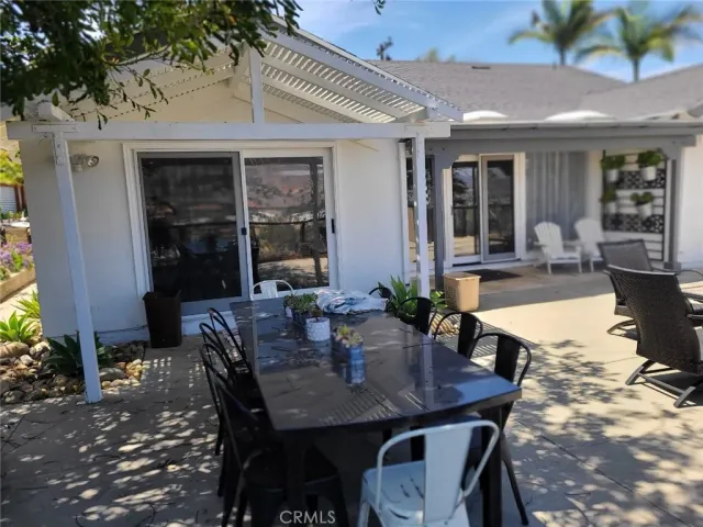 a view of a terrace with furniture