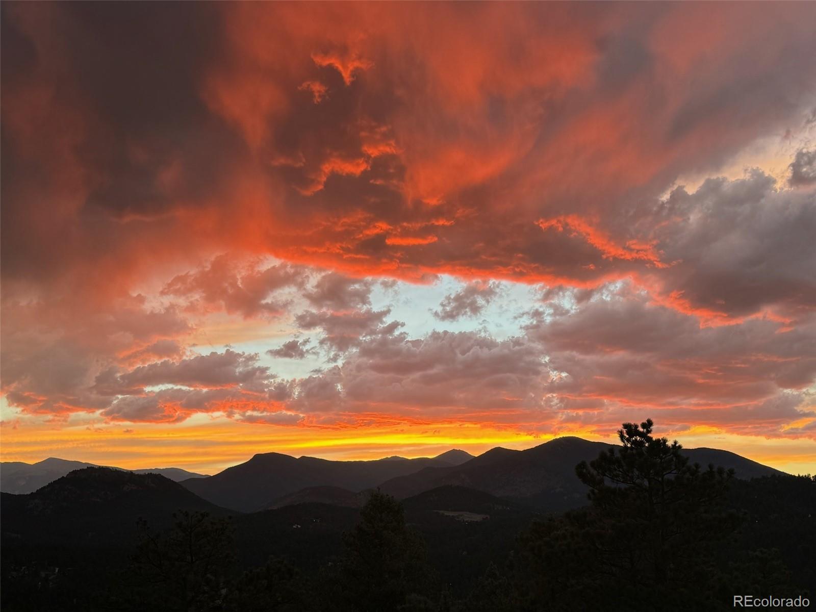 4331 Hilltop Road Evergreen, CO 80439 - Photo 45 of 45 a view of sunset