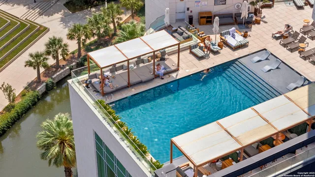 a view of an outdoor sitting area with furniture