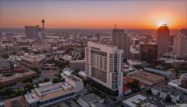 a view of an outdoor sitting area with furniture