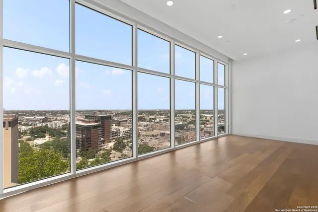 a view of an empty room and window