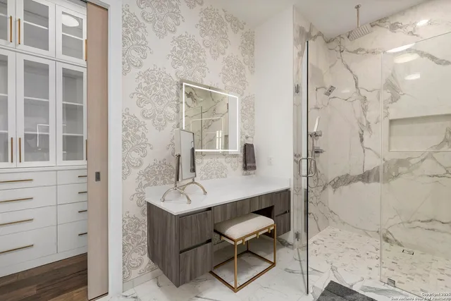 a view of a patio with swimming pool table and chairs