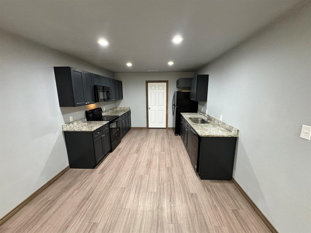 462 Derrs Chapel Road Italy, TX 76651 - Photo 5 of 19 Open Kitchen leading to laundry room area