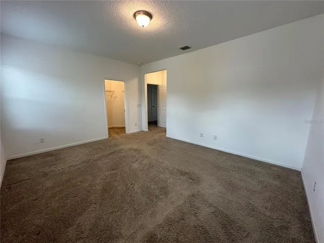 a view of small space with racks on the wall