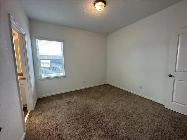a room with water heater and storage
