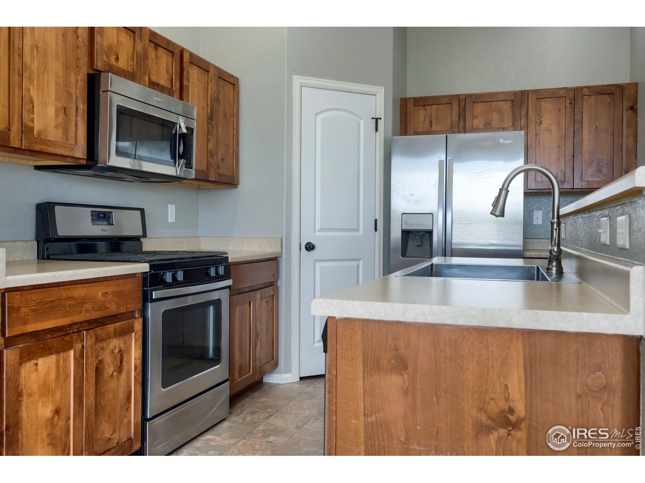 7424 23rd St Road Greeley, CO 80634 - Photo 12 of 40 Kitchen with stainless steel appliances