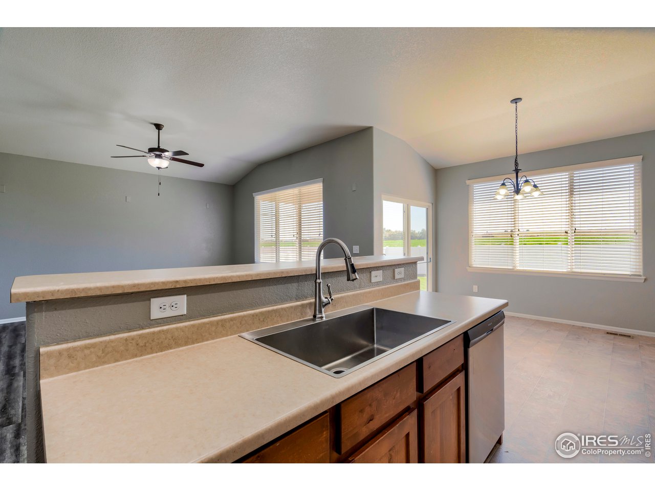 7424 23rd St Road Greeley, CO 80634 - Photo 14 of 40 Large sink in kitchen island