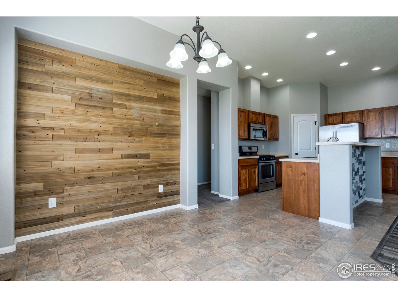 7424 23rd St Road Greeley, CO 80634 - Photo 18 of 40 Dining area looking into kitchen