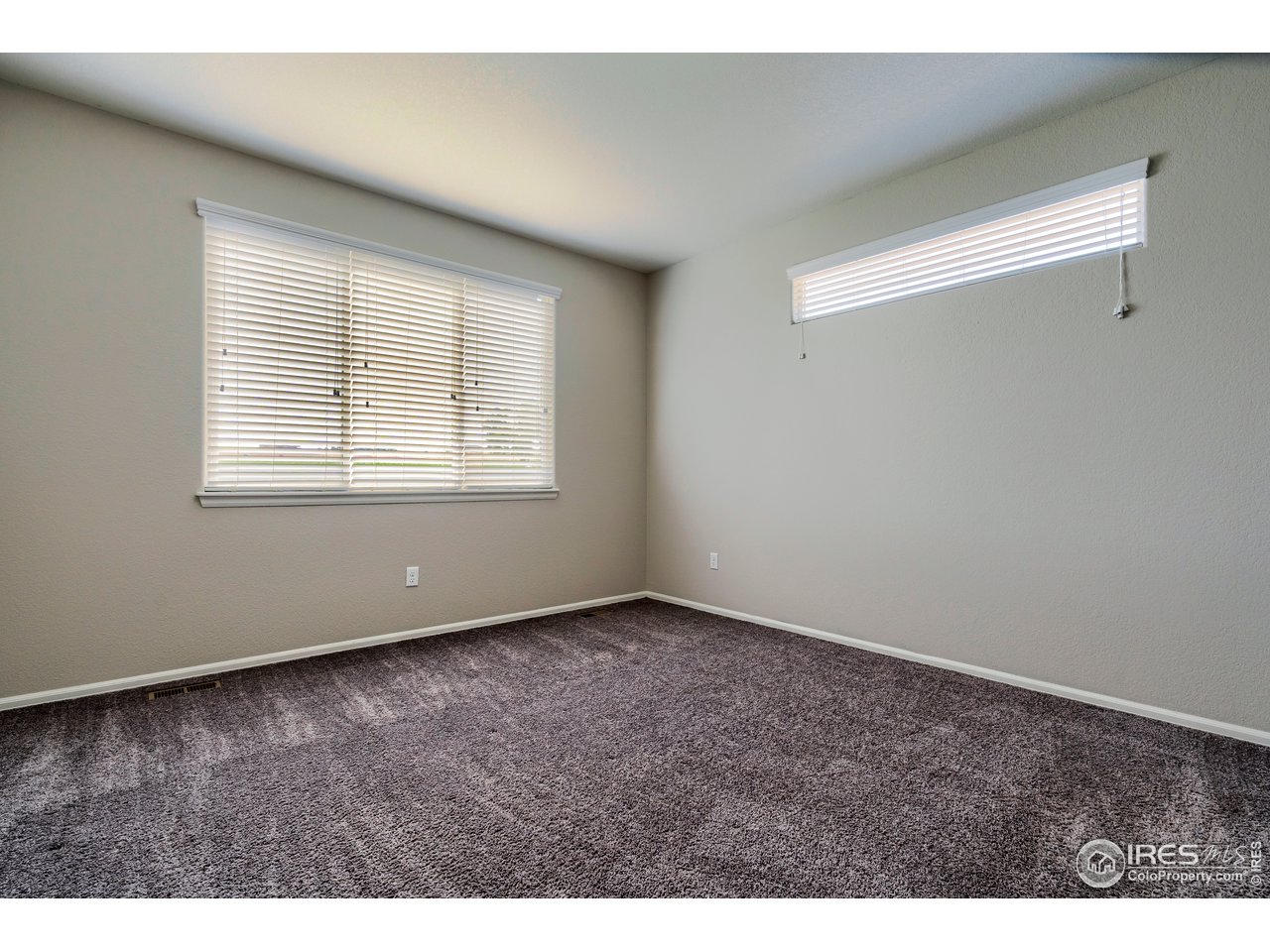 7424 23rd St Road Greeley, CO 80634 - Photo 33 of 40 Master bedroom