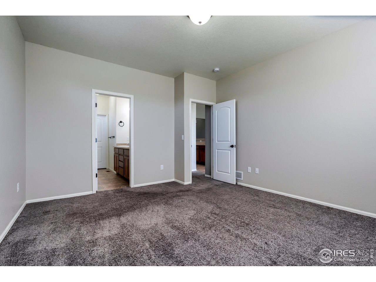 7424 23rd St Road Greeley, CO 80634 - Photo 35 of 40 Master bedroom