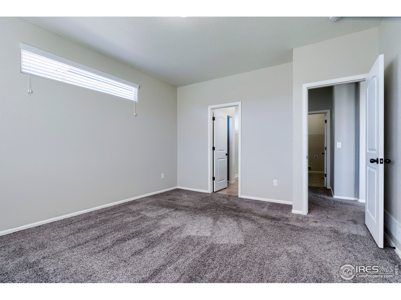 7424 23rd St Road Greeley, CO 80634 - Photo 36 of 40 Master bedroom