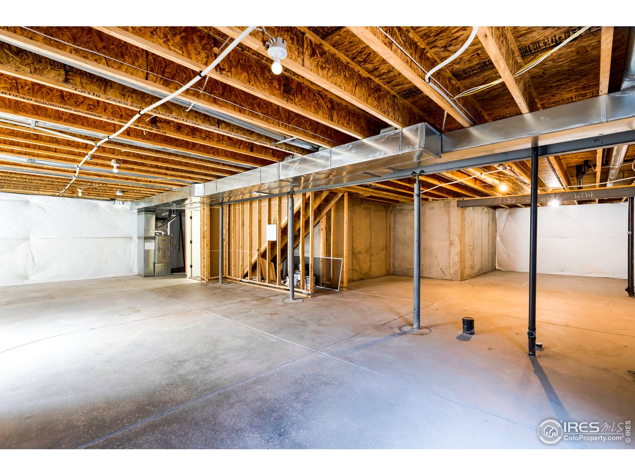 7424 23rd St Road Greeley, CO 80634 - Photo 39 of 40 unfinished basement with wrap insulation