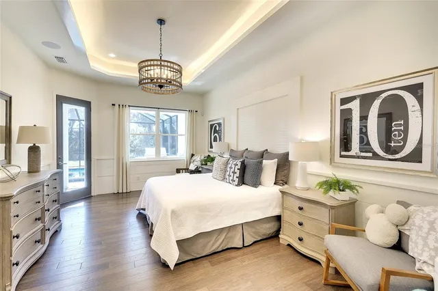 a bedroom with bed and window