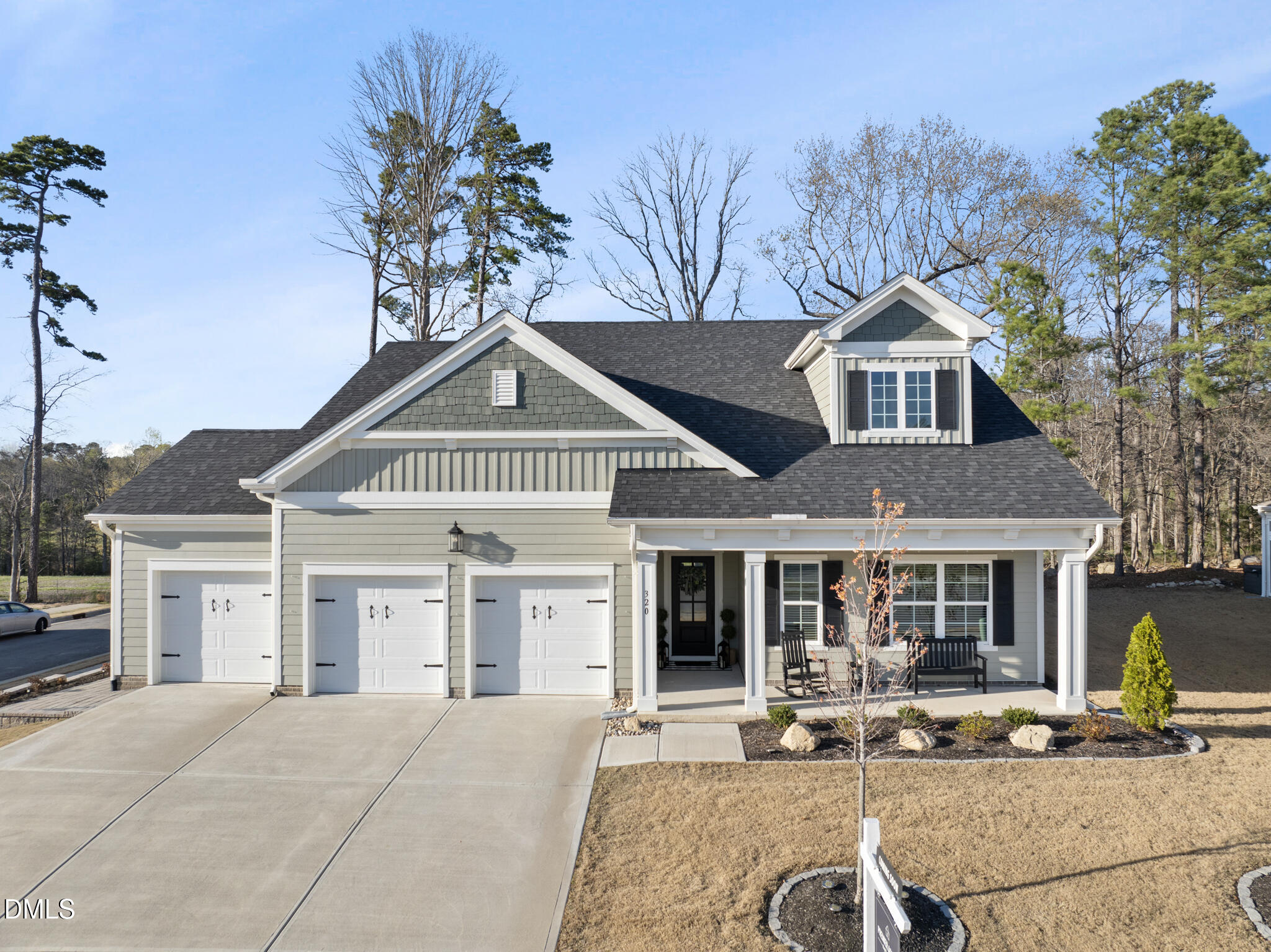320 Kavanaugh Road Wake Forest, NC 27587 - Photo 1 of 32 a front view of a house with garden and patio
