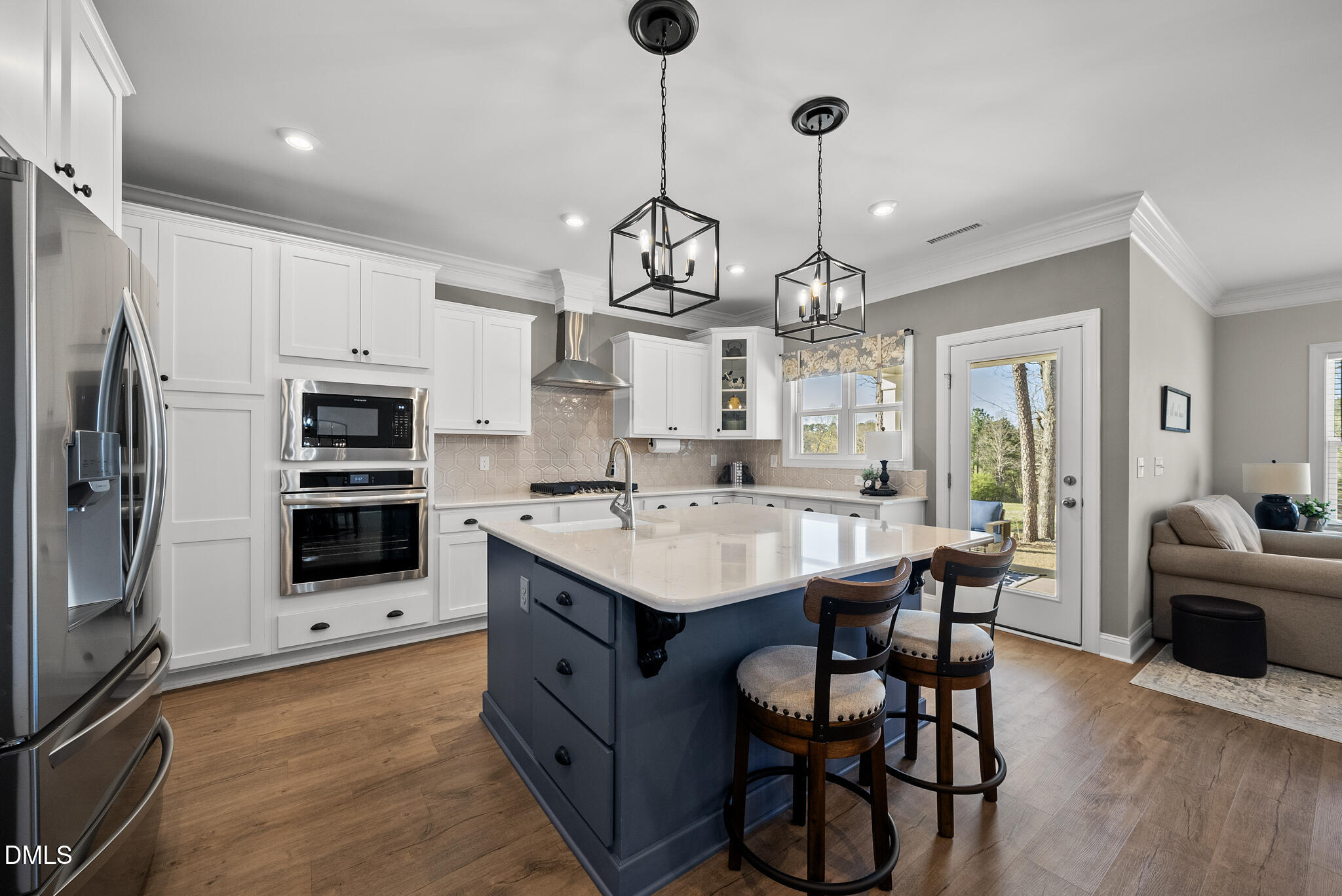 320 Kavanaugh Road Wake Forest, NC 27587 - Photo 2 of 32 a kitchen with stainless steel appliances a stove a sink island and a refrigerator