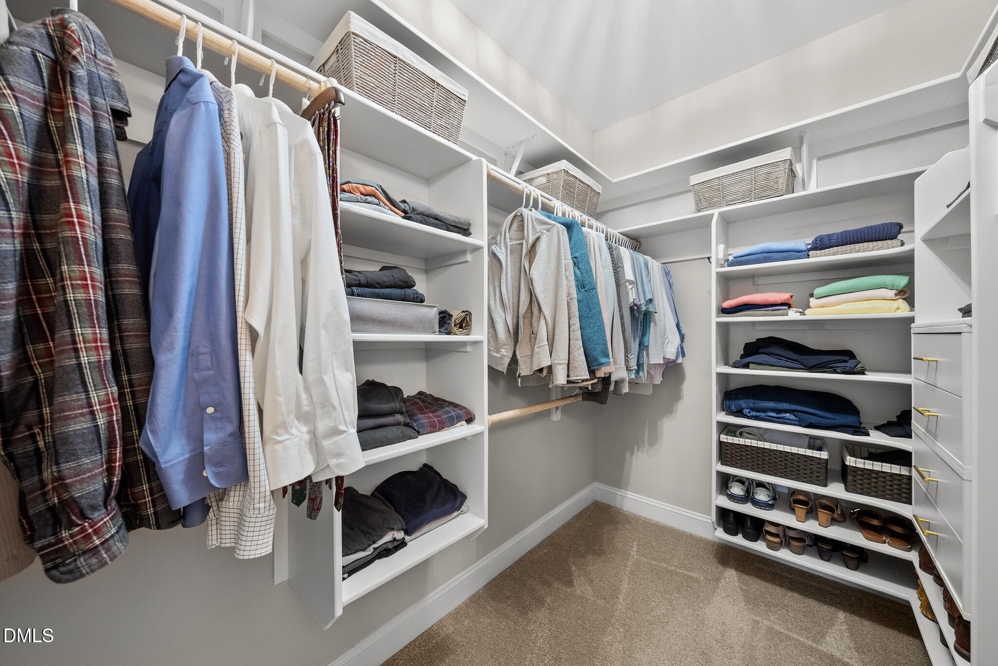 320 Kavanaugh Road Wake Forest, NC 27587 - Photo 21 of 32 a view of walk in closet with clothes and shoes