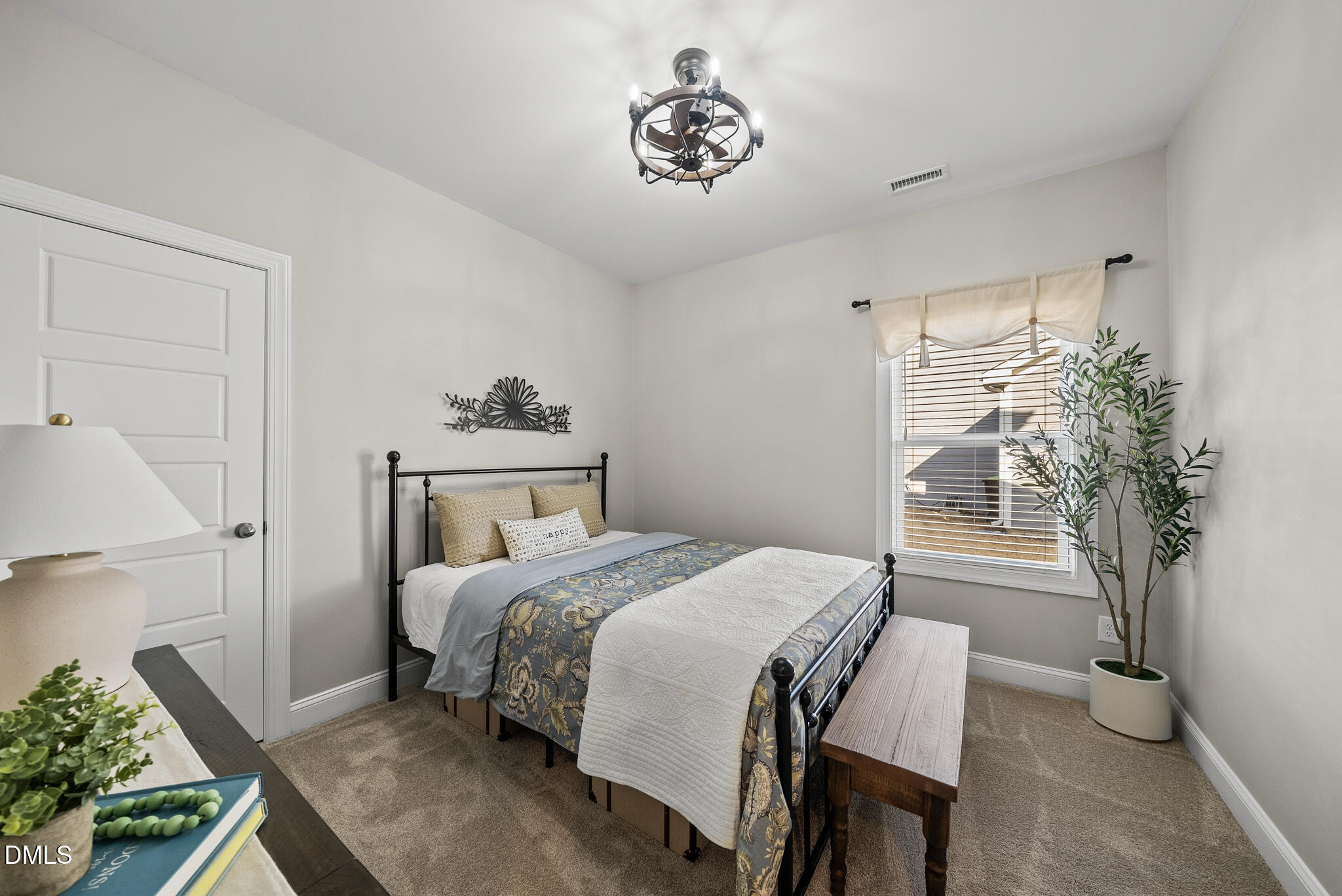 320 Kavanaugh Road Wake Forest, NC 27587 - Photo 22 of 32 a bedroom with a bed and a table in it