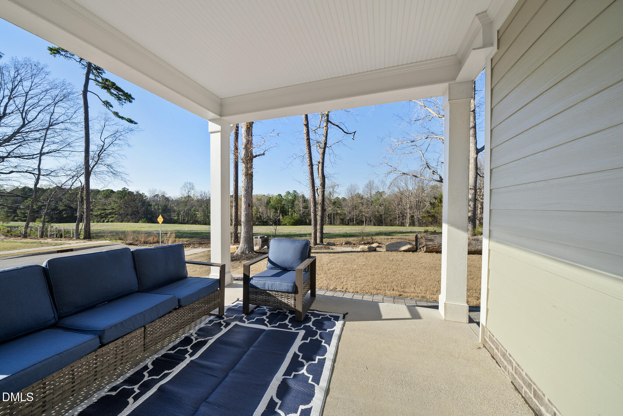 320 Kavanaugh Road Wake Forest, NC 27587 - Photo 29 of 32 a living room with couch and a large window