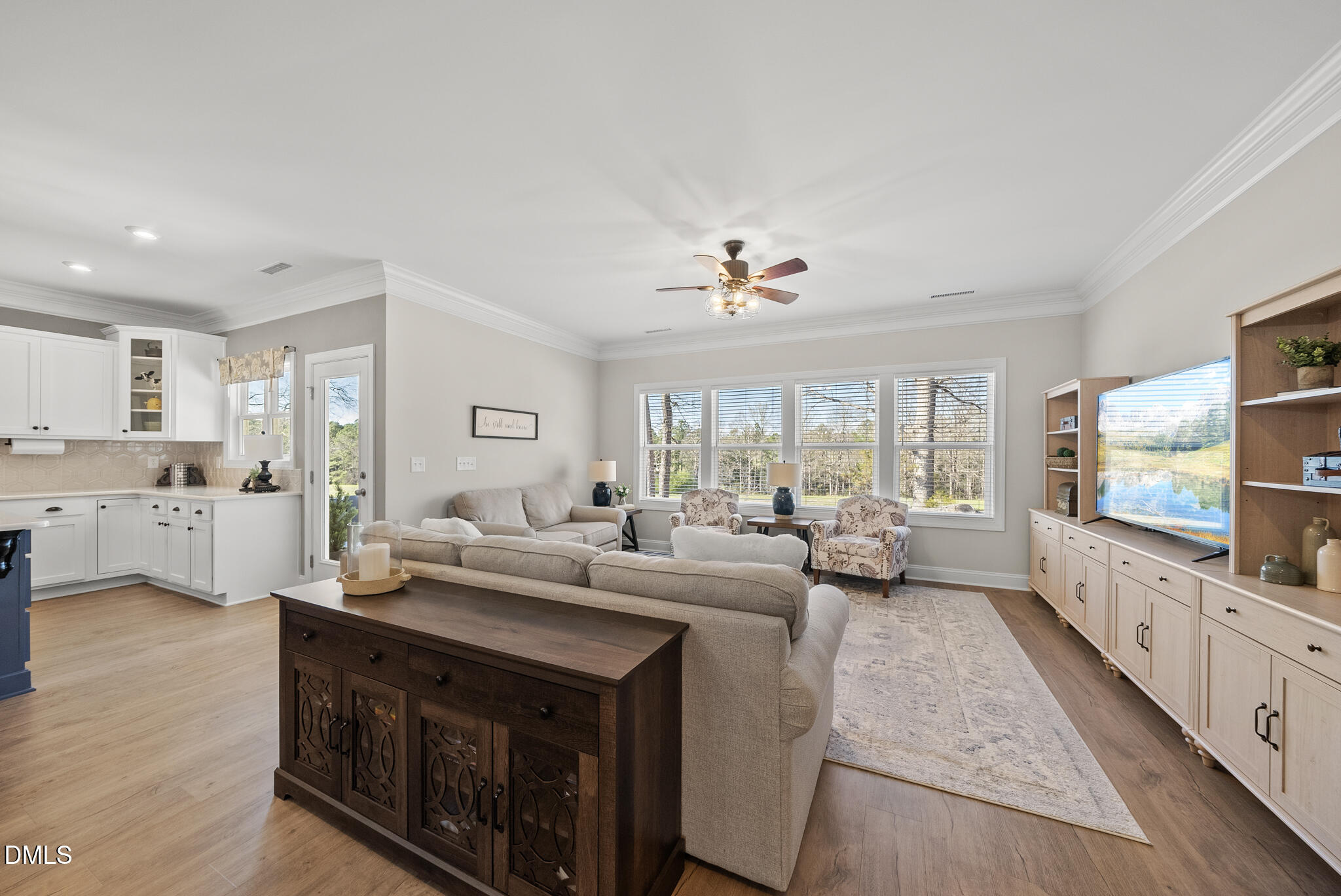 320 Kavanaugh Road Wake Forest, NC 27587 - Photo 3 of 32 a living room with furniture and a flat screen tv