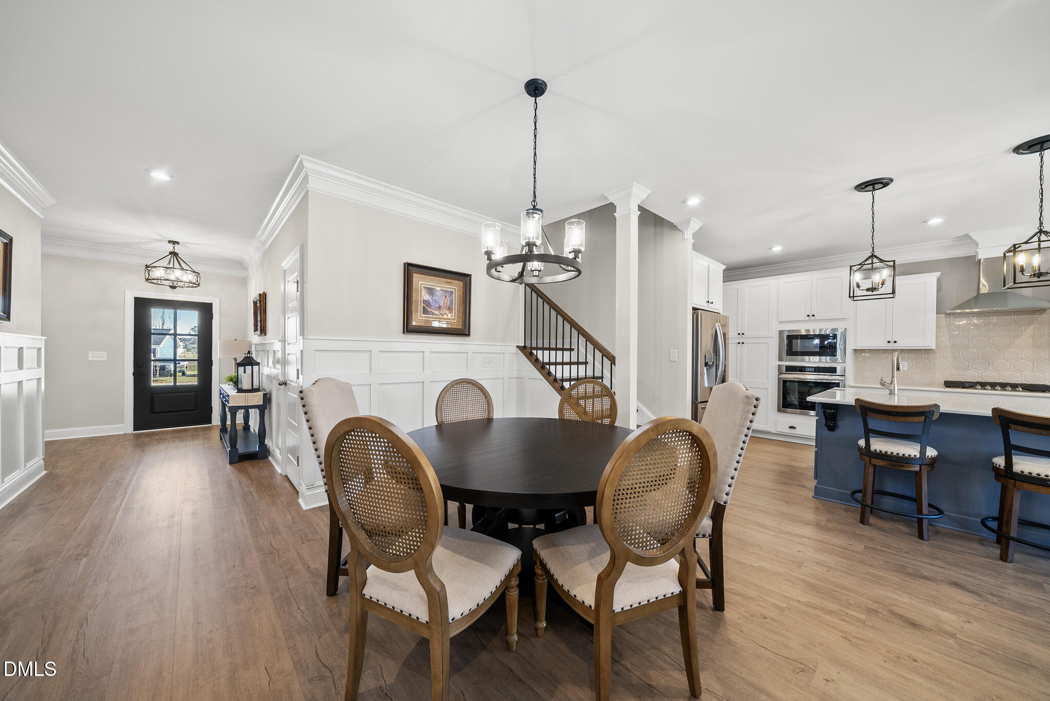 320 Kavanaugh Road Wake Forest, NC 27587 - Photo 4 of 32 a dining room with furniture and wooden floor