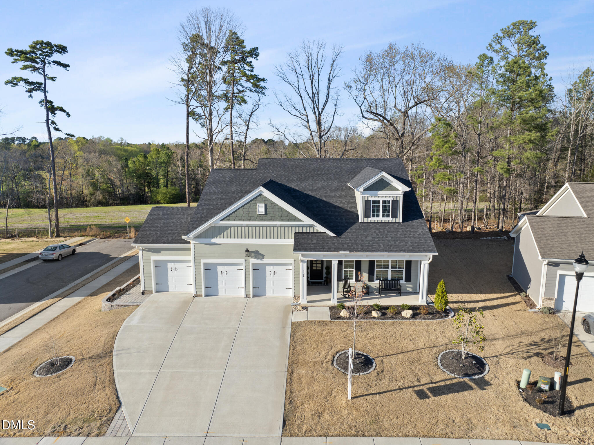 320 Kavanaugh Road Wake Forest, NC 27587 - Photo 9 of 32 a house with trees in the background