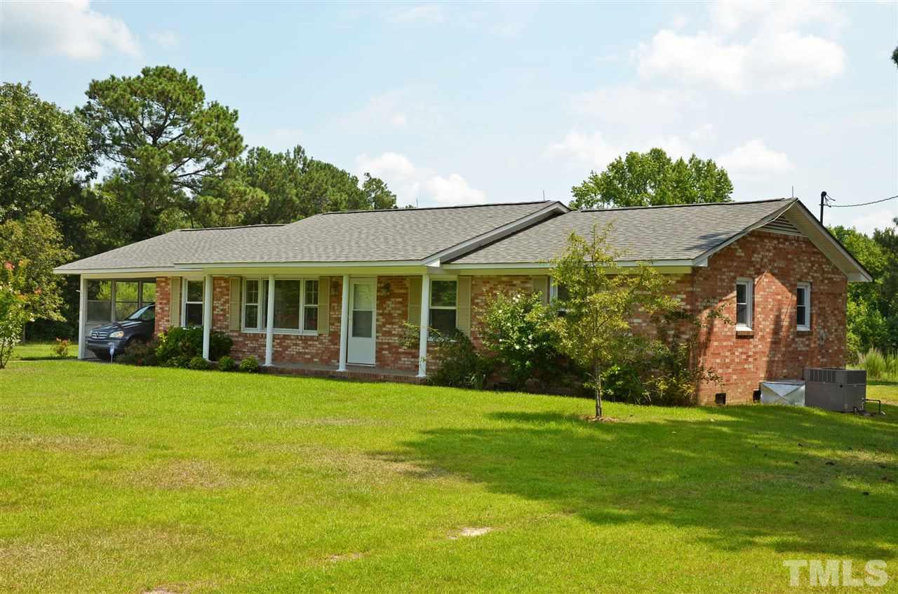 4228 Lassiter Road Wake Forest, NC 27587 - Photo 1 of 20 a view of a house with a yard