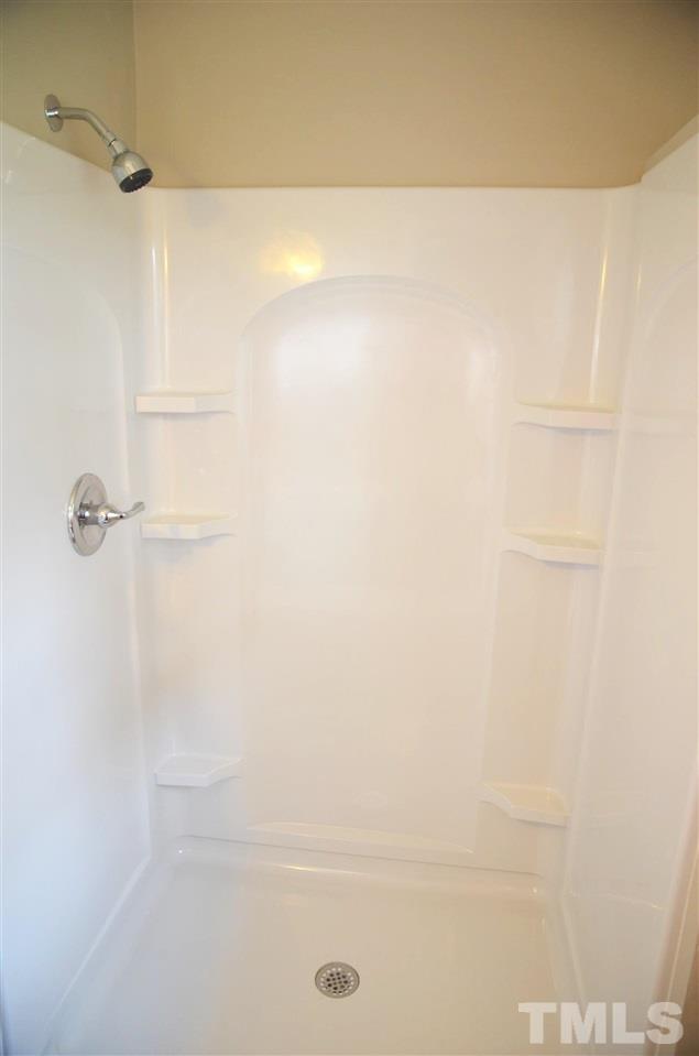 4228 Lassiter Road Wake Forest, NC 27587 - Photo 16 of 20 a close up of a shower