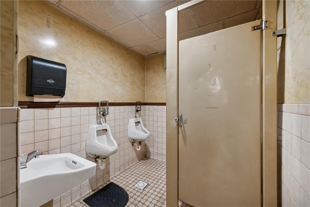155 Smolleck Street Whitney, PA 15693 - Photo 13 of 39 a bathroom with a sink and a mirror