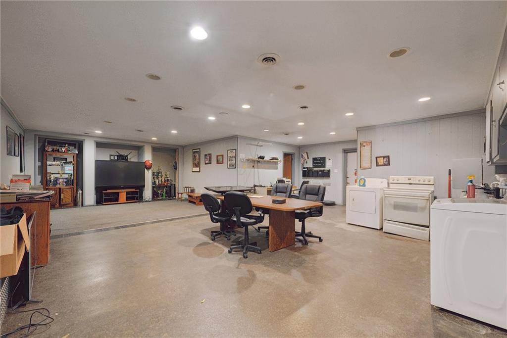 155 Smolleck Street Whitney, PA 15693 - Photo 23 of 39 a living room with furniture and kitchen