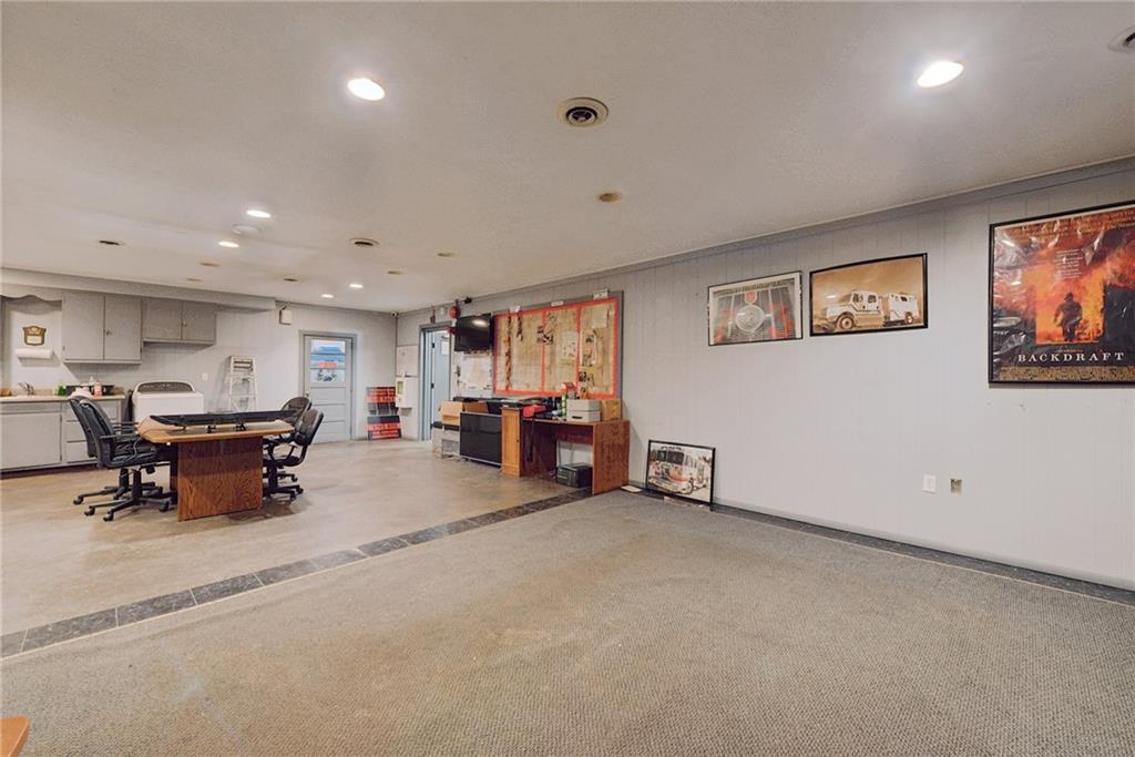 155 Smolleck Street Whitney, PA 15693 - Photo 25 of 39 a large living room with furniture and a large window