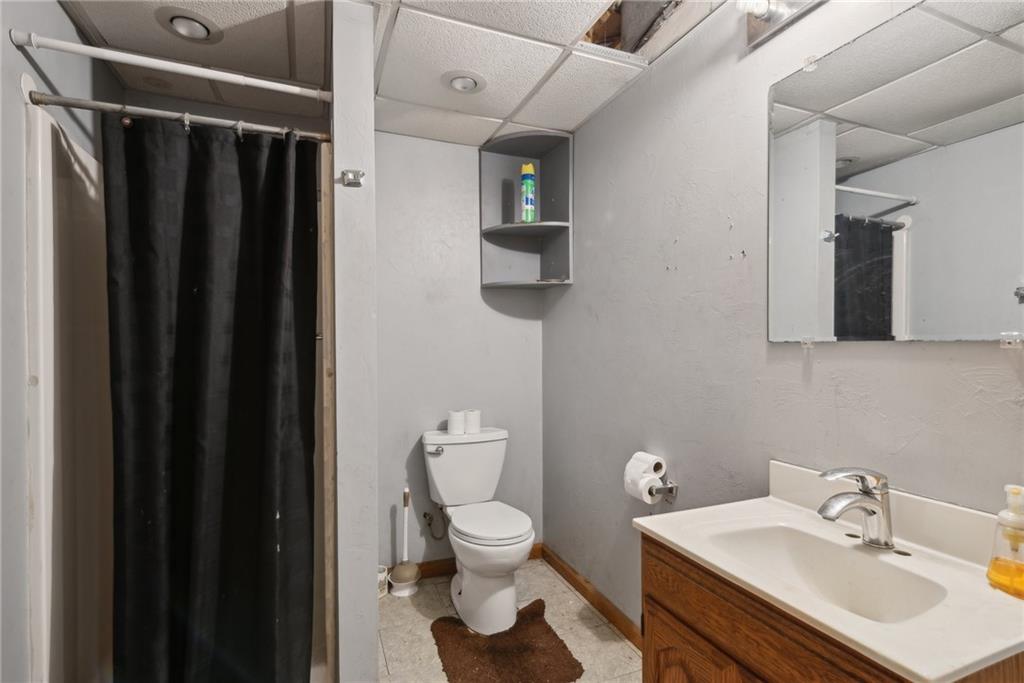 155 Smolleck Street Whitney, PA 15693 - Photo 27 of 39 a bathroom with a sink toilet and shower