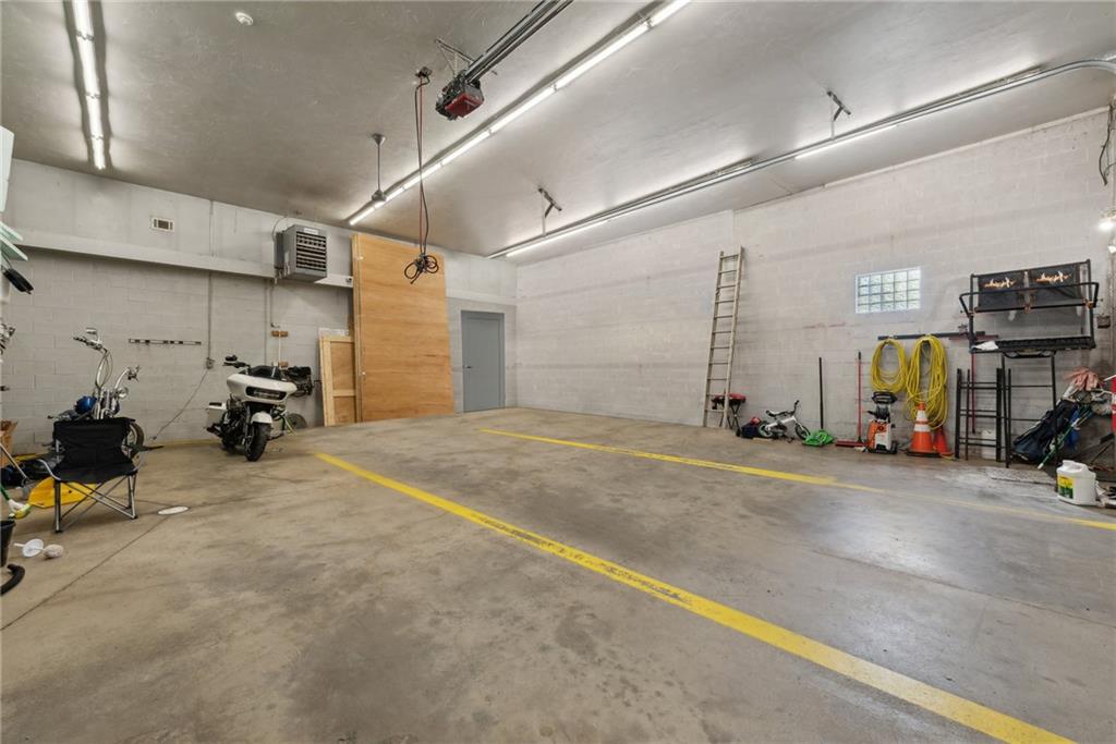 155 Smolleck Street Whitney, PA 15693 - Photo 29 of 39 a view of a garage with cars